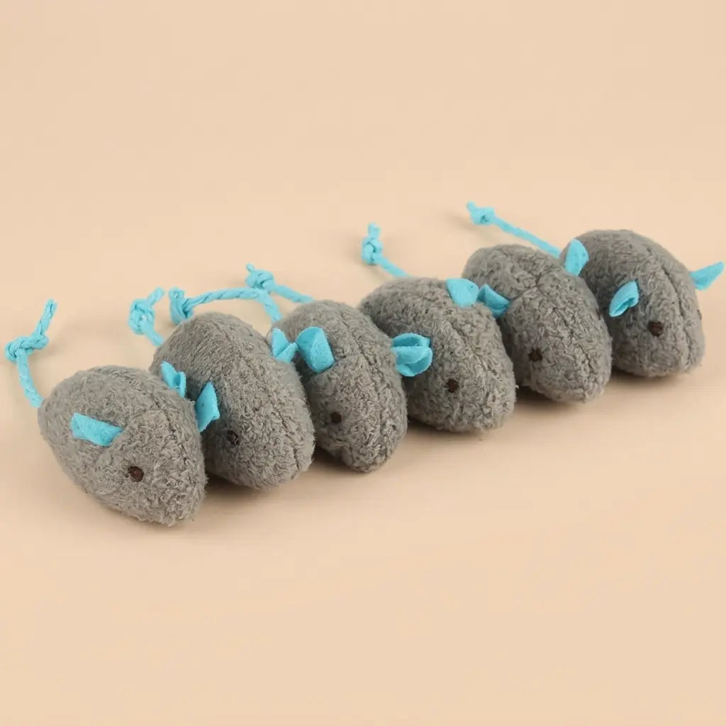 doudou pour chat gris en peluche avec oreilles bleues et corde