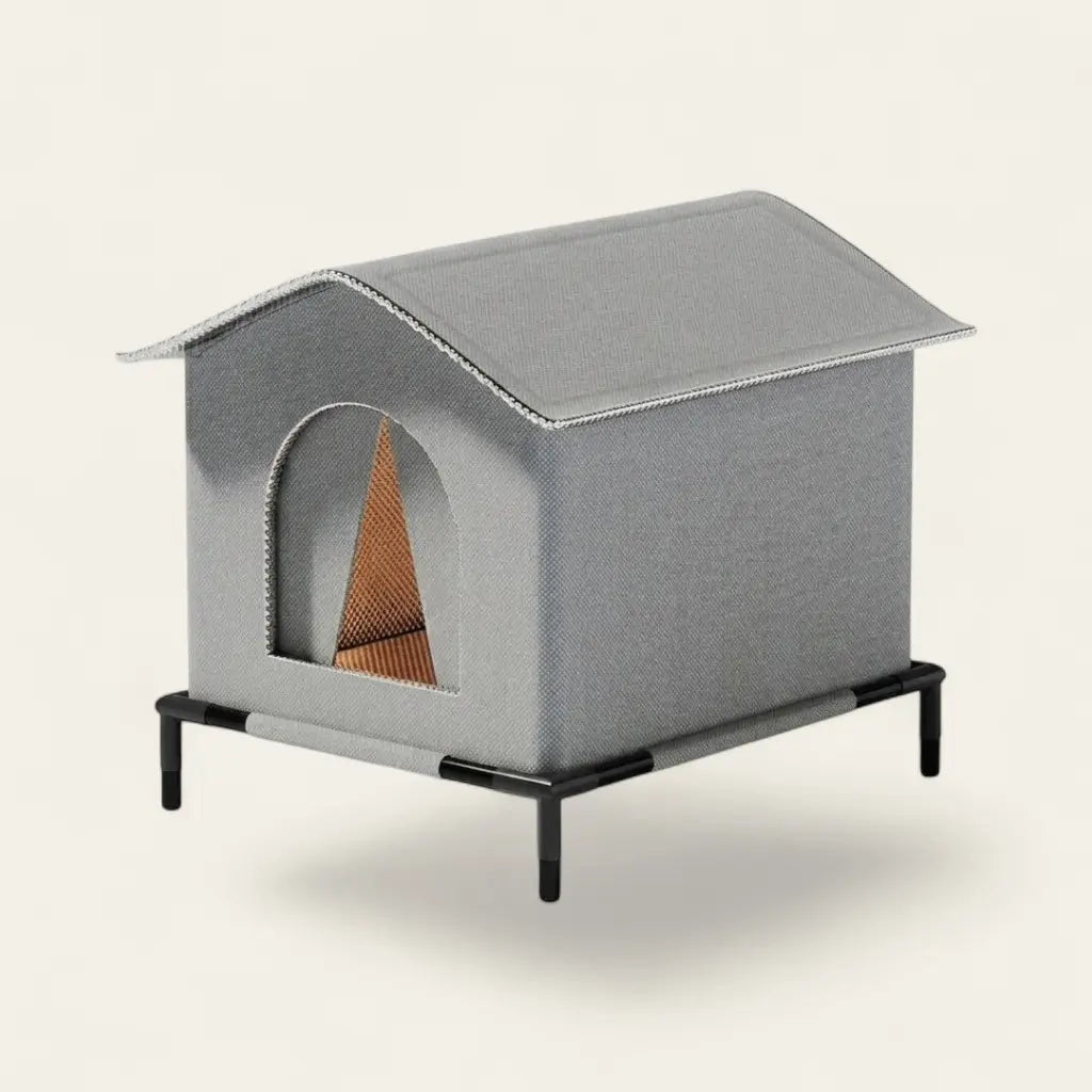 Abri chat extérieur imperméable sur pieds avec espace de repos surélevé, conçu pour protéger le chat des intempéries.