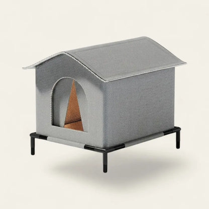 Abri chat extérieur imperméable sur pieds avec espace de repos surélevé, conçu pour protéger le chat des intempéries.