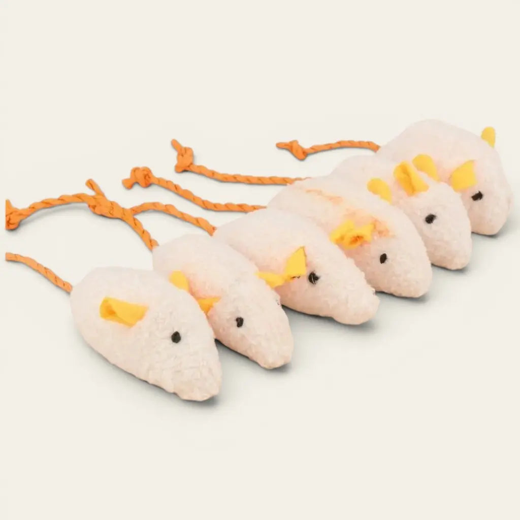 Doudou pour chat en forme de souris rose avec oreilles jaunes et queue en corde, idéal pour le jeu quotidien du félin.